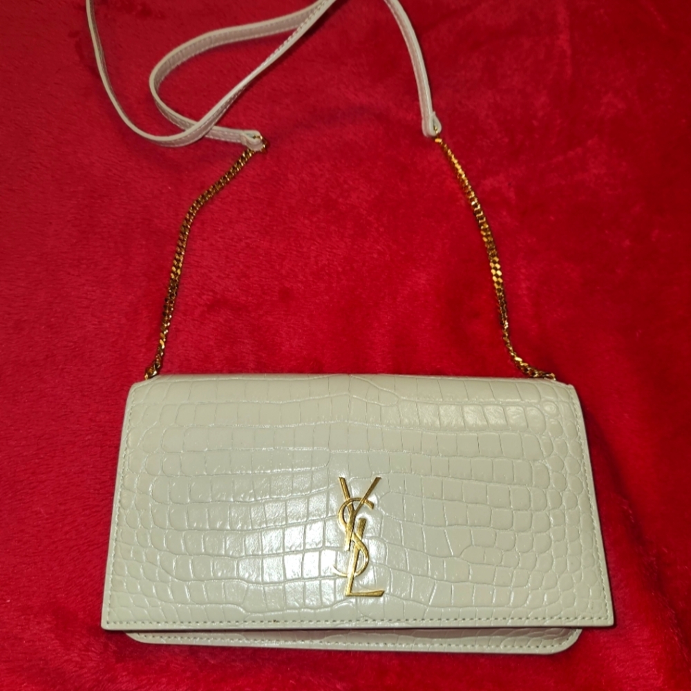 Authentic Like New YSL phone holder with strap